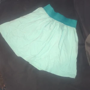 Light blue skirt  - Size: 134/140, might need to be straightened because it’s kinda wrinkly 