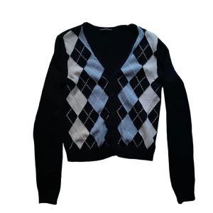 brandy melville rutig cardigan - Kofta från brandy melville, enbart använd någon enstaka gång. Köparen står för frakt! 🩷