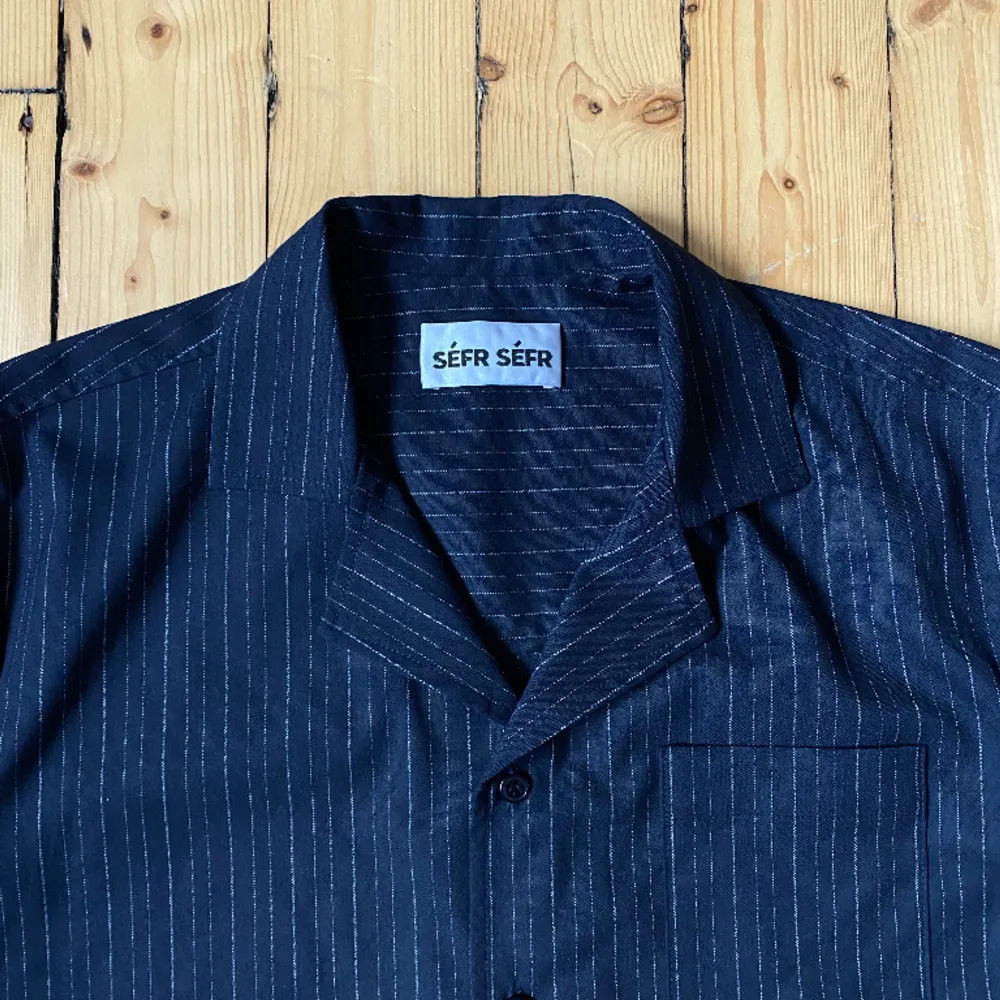 Nice and light camp collar shirt from Swedish label Séfr Séfr. Fabric feels very soft and flows really nicely. Probably fits a size S/46 as well. Still in very good condition. . Blusar.