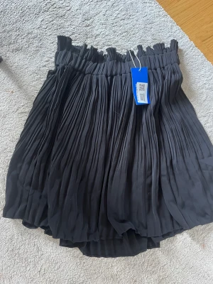 Kjol - Svart kjol från NAKD, bra skick