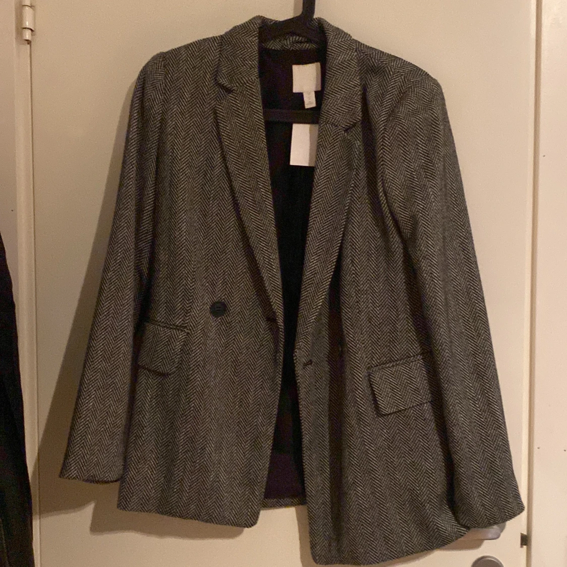 Oanvänd kappa/blazer