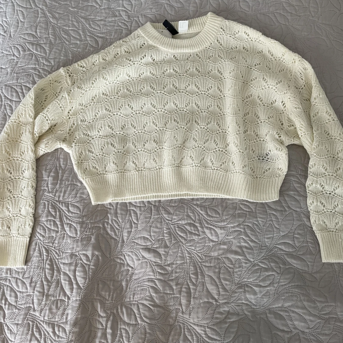 Vit stickad tröja