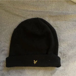 Mössa  - Lylen scott mössa, riktigt 