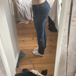 Diesel jeans  - Lågmidjade straight diesel jeans mörk blåa 26w 45l