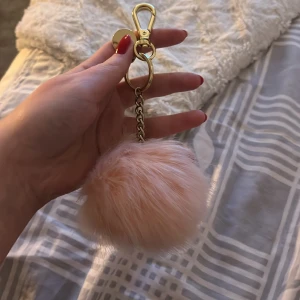 Pompom - Ljusrosa Pompom nyckelring.💓