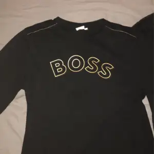 Billig boss långarmad t shirt priset kan diskuteras 