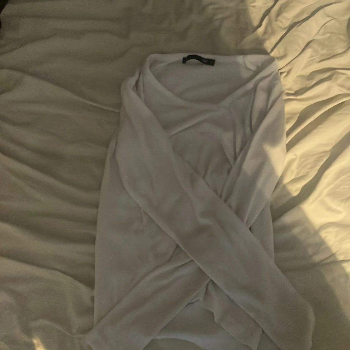 Vit lång ärmad med en v neck