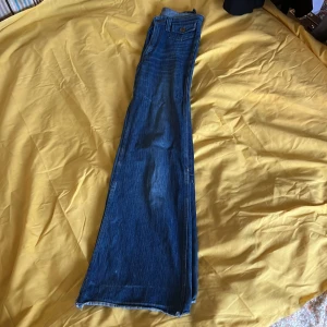 Vintage 70s byxor  - Ett par utsvängda jeans