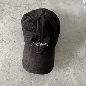New Black Cap - Black cap unisex.