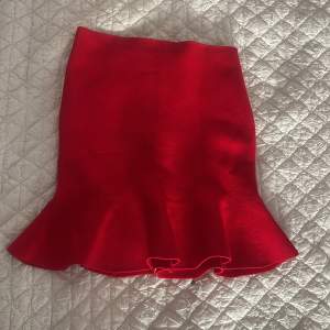 Short peplum mink skirt. Red. 