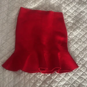 Peplum Mini skirt  - Short peplum mink skirt. Red. 