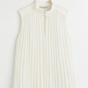 Linne från H&M - Jättefint slutsålt linne från H&M. Aldrig använt. 