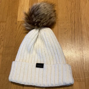 Sätila mössa - Inte mycket använd 