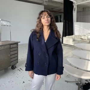 Design by si kappa - Kappa från design by si i storlek xs/s, köpt i april men knappt använd. Nypris 757kr. Kan skicka egna bilder. Frakt tillkommer