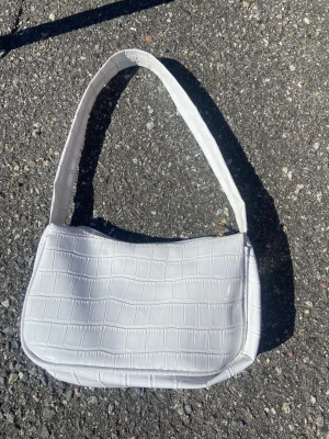 Väska - Skriv för frågor