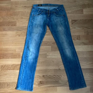 Lee Jeans  - Lågmidjade Lee jeans, Lynn, W25 L33