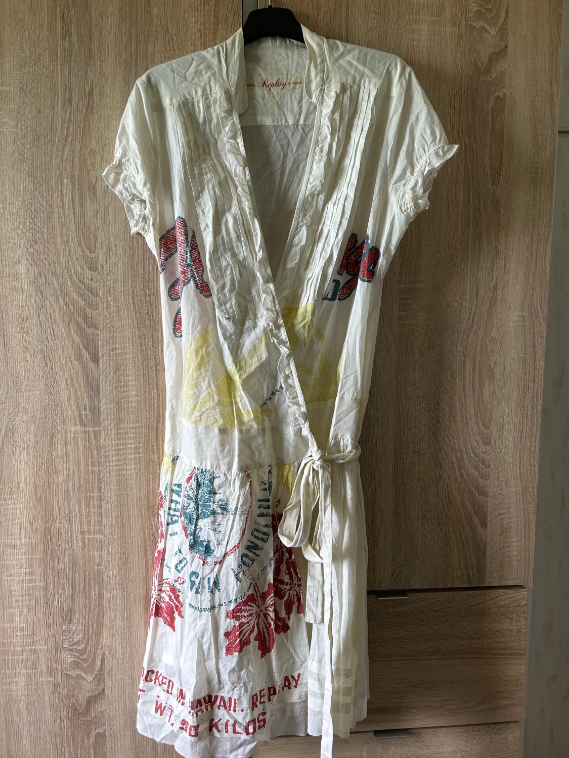 En Replay omlott sommarklänning i strl L 