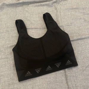 Adidas Sport Bra  - L size with a small cutting. Only wore once. See image for size details
