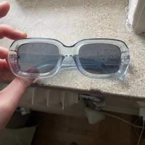 Solglasögon  - Sparsamt använda 