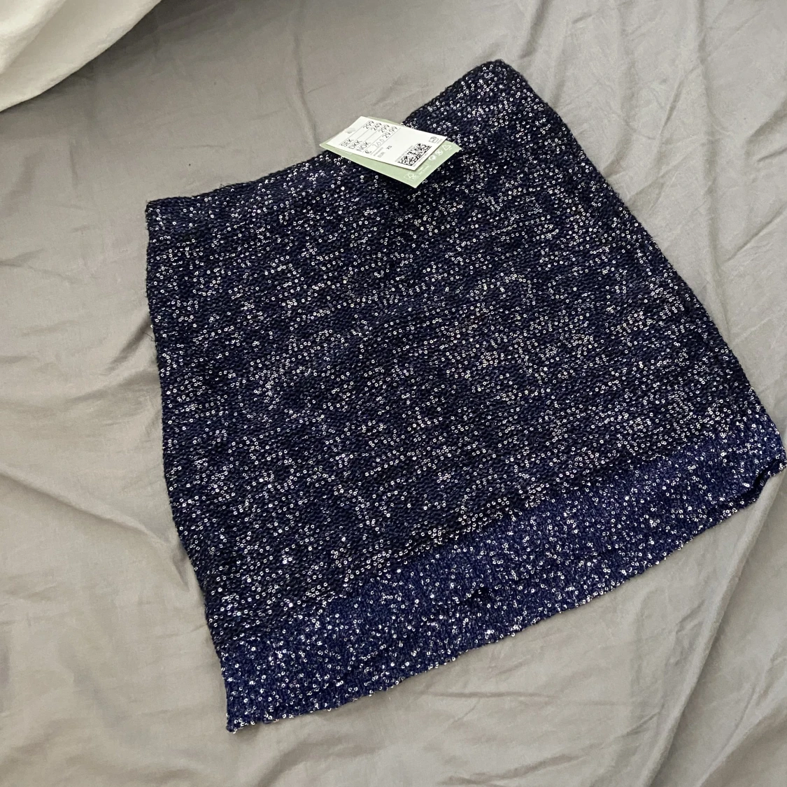 Glittrig minikjol - 91