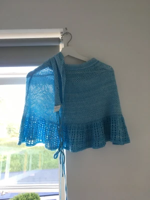 Strand outfit - Både kjol och topp med snörning, har aldrig använt det men sitter väldigt snyggt på.