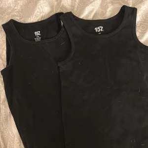 2  -  två svart linnen 