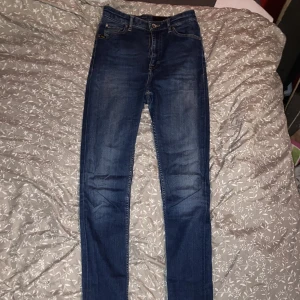 Jeans - Högmidjade, töjbara