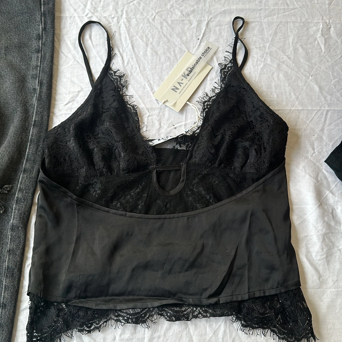 Spets och silkestopp