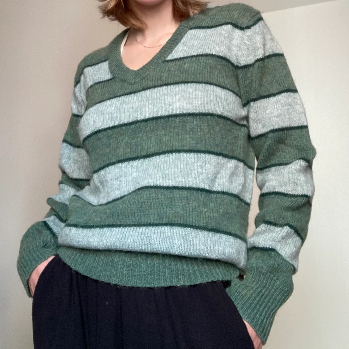 Grön stickad tröja