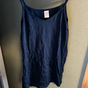 Långt linne stl L/XL - Aldrig använt!