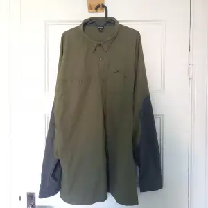 Olive lightweight buttoned up Patagonia shirt