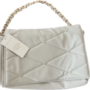 Väska  - Beige väska 