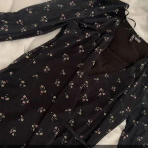 Klänning - Långärmad klänning 