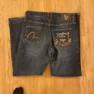 evisu jeans - storlek 31