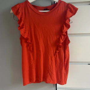 Fin lys röd tröja - Aldrig använt 