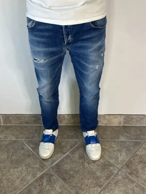 Dondup Mius Jeans - CONDITION — 9/10 Excellent condition.  Light signs of wear.     SIZE — 35 Model is 170 cm, 67kg  MEASUREMENTS (CM) (Please refer to the last photo for measurement guide)  A — 45 cm  B — 88 cm  C — 17 cm