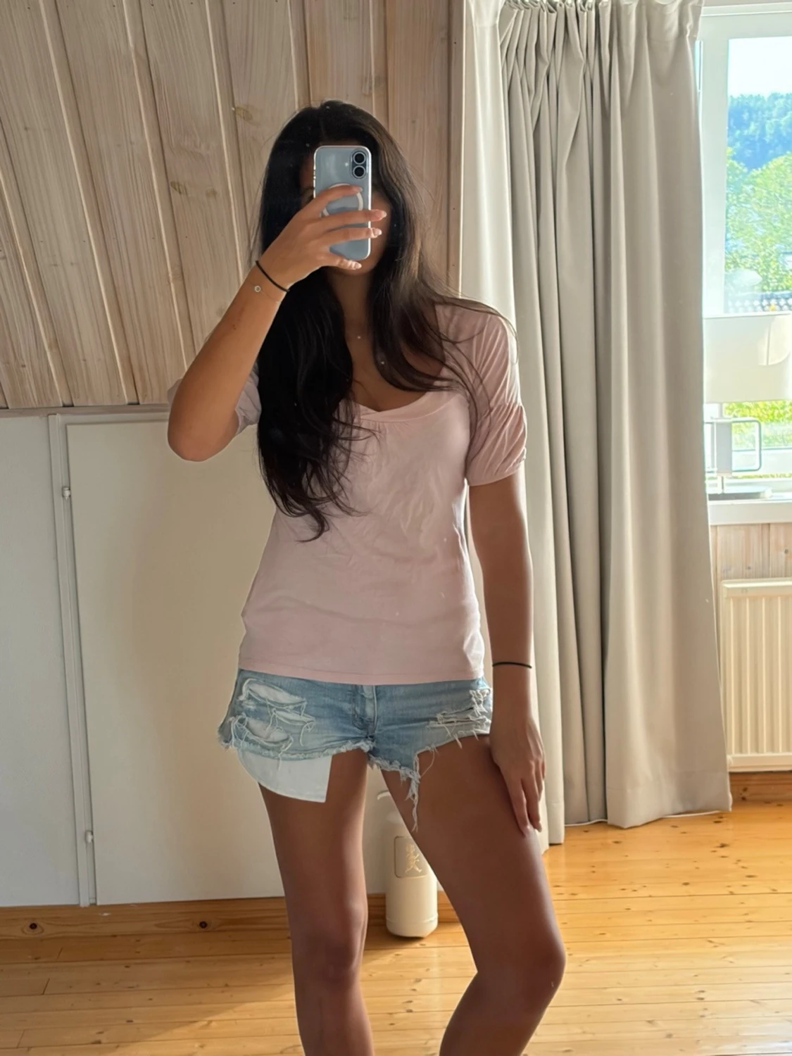 Ljusrosa topp med puffärm