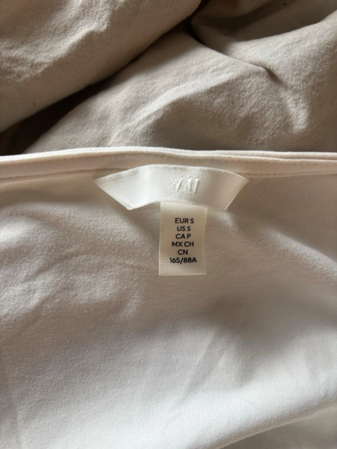 Vit långärmad body från H&M - 1