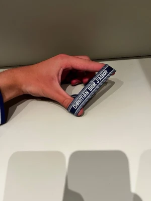 Christian Dior  - Armband från Christian dior som aldrig är använda. Säljer för 220kr styck däremot om du köper båda så betalar du endast 400kr.