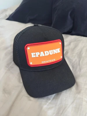 ”EPADUNK” keps från John hatter - HELT NY! EPADUNK keps från John hatter som aldrig kommit till användning!