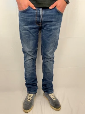 Nudie jeans lean dean - Säljer nu dessa nudie jeans | Modell: lean dean | size : W 34 L 36, midja 44cm längd 111cm | fint skick | modellen är 180cm | skriv vid intresse🤩