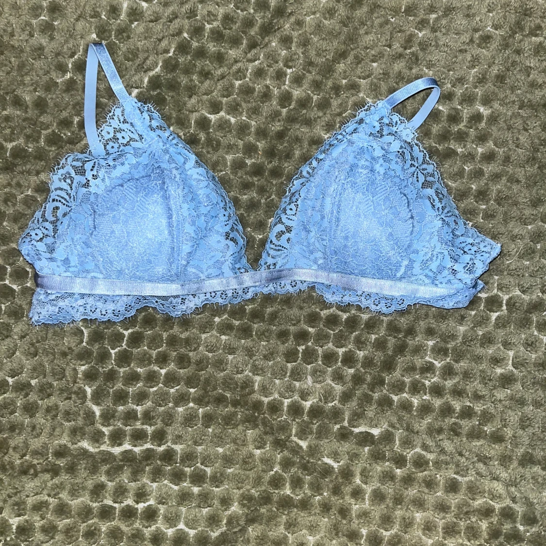 Ljusblå spetsig linnetopp