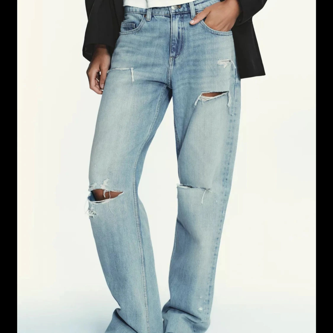 Ljusa ripped wide jeans