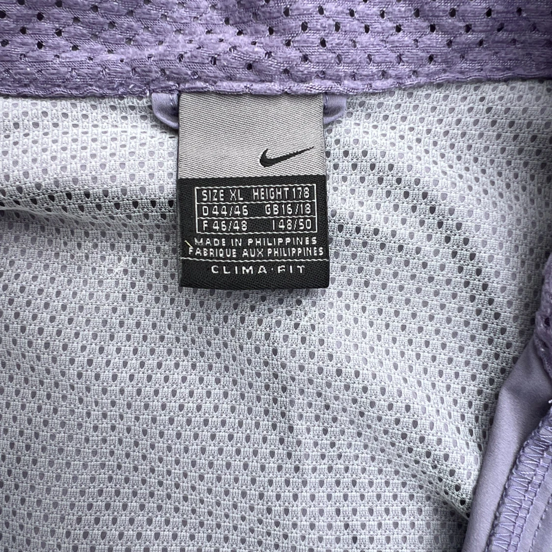 Ljuslila vindjacka från Nike XL - 1