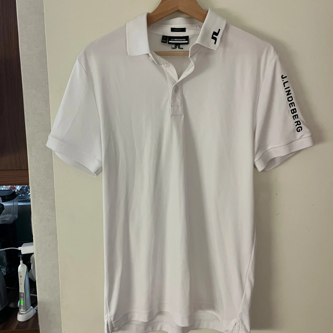 Vit piké från J.Lindeberg