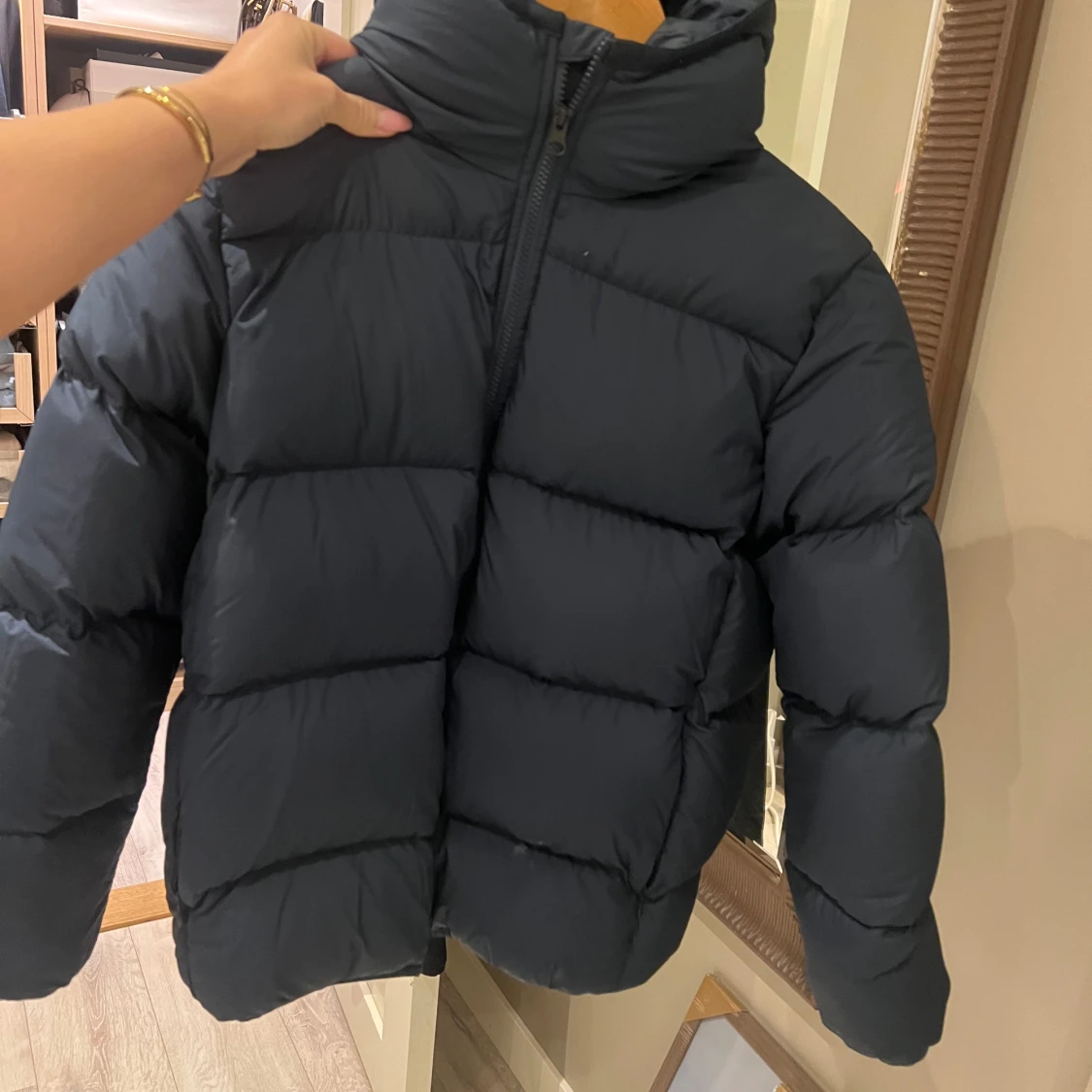 Svart pufferjacka Peak Performance S