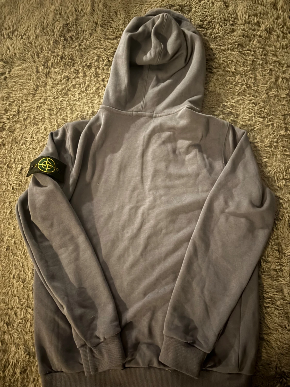 Grå hoodie från Stone Island - 1