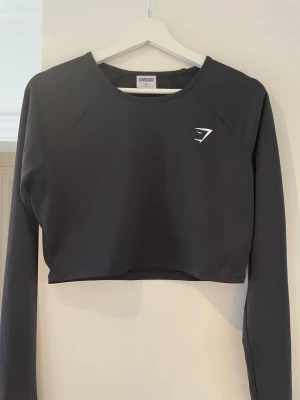 Träningstopp från gymshark - Skön träningstopp från gymshark. Luftigt material. Stl M men passar även S 