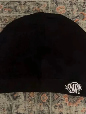 Syna world mössa  - Syna world mössa helt ny