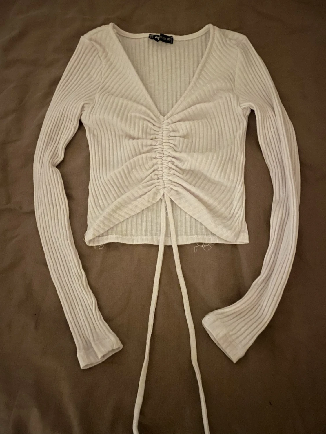 Vit ribbad omlottopp från RB Sister